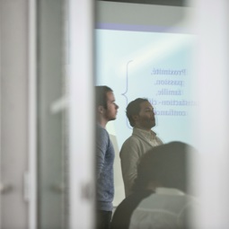 Two students present a project